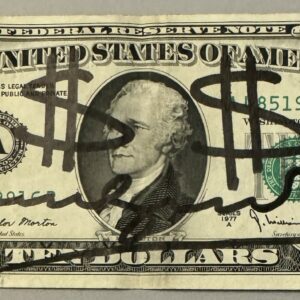 Andy WARHOL (1928-1987), Attribué à. Billet de 10 dollars Américain. Signé « Andy Warhol » au marqueur. Billet datant de 1977.  Dimensions : 6,6 x 15,6 cm.