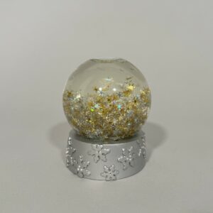 SWAROVSKI.  Boule à neige contenant des
