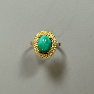 TRAVAIL ETRANGER - BAGUE en or 18k étranger serti d’une turquoise.  TDD :55. Poids brut : 6 gr (environ)