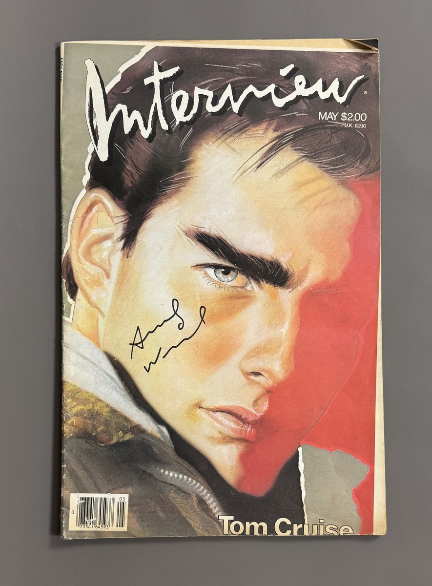 Andy WARHOL (1928-1987) Attr. Magazine INTERVIEW May 1986. Magazine créé par Andy WARHOL en 1969. Couverture : Tom Cruise . Porte une signature au feutre en couverture Attribué à Andy Warhol. En l’état (pliures, quelques déchirures)