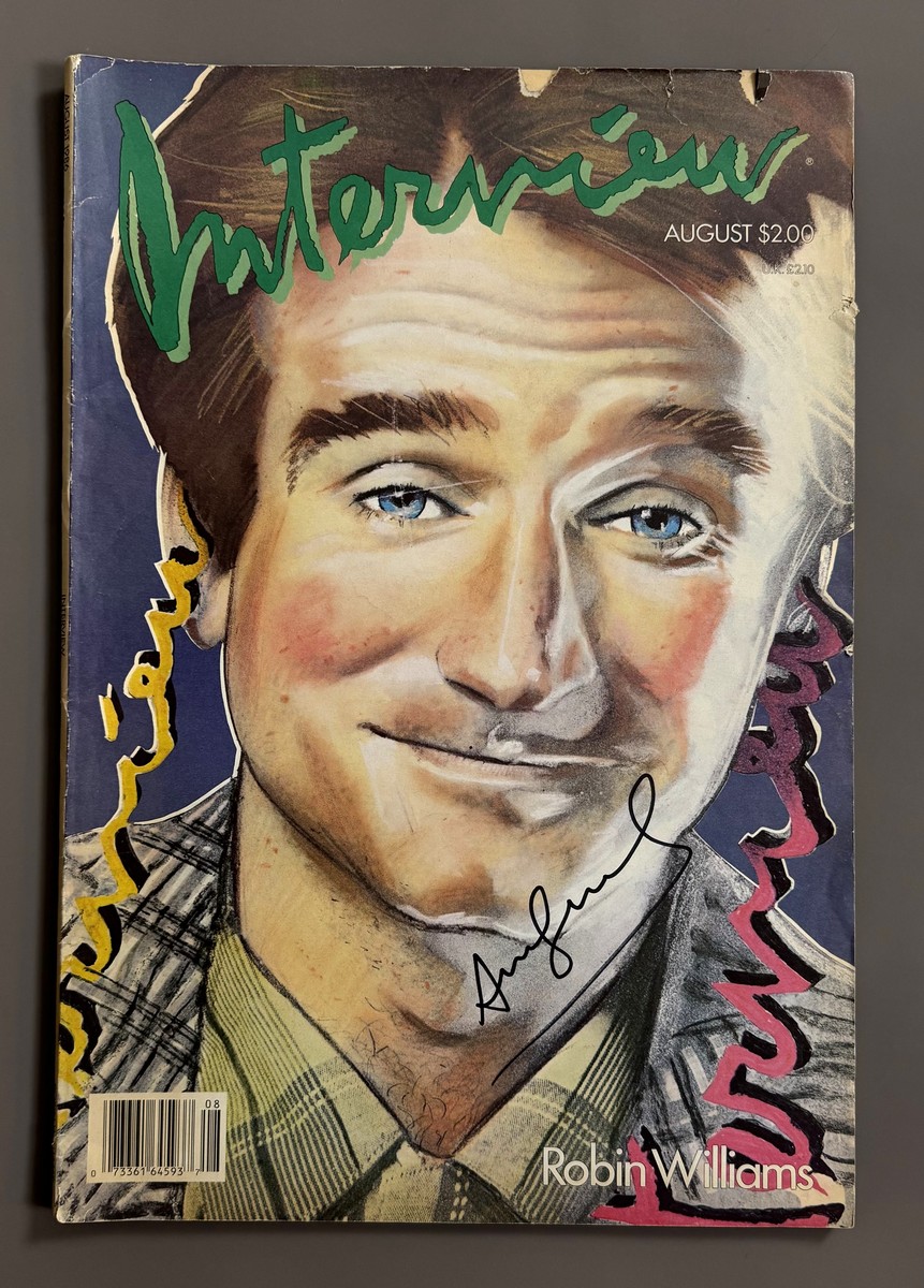 Andy WARHOL (1928-1987) Attr. Magazine INTERVIEW August1986. Magazine créé par Andy WARHOL en 1969. Couverture : Robin Williams . Porte une signature au feutre en couverture Attribué à Andy Warhol.