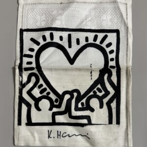 Keith HARING (1958-1990), Attribué à.   Peinture sur serviette en tissu. Signé.