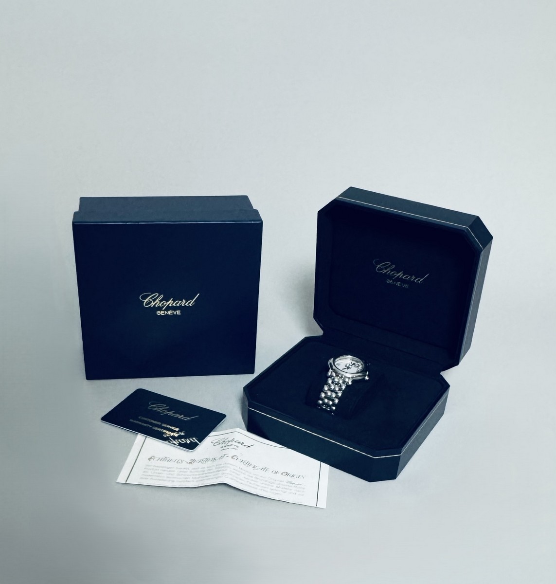 Montre CHOPARD, modèle "Happy Sport", à mouvement quartz, boitier acier 26 mm, cadran blanc, chiffres romains et chemin de fer, 7 diamants mobiles (total de 0,15 ct environ). – Image 5