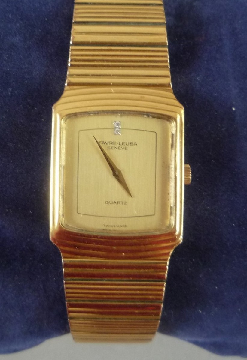 FAVRE-LEUBA -MONTRE-BRACELET pour homme en plaqué or. Cadran rectangulaire , fond champagne, rehaussée de deux brillants ,