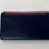 SAINT-LAURENT   Portefeuille en cuir noir et rouge verni. – Image 2
