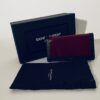 SAINT-LAURENT   Portefeuille en cuir noir et rouge verni. – Image 3