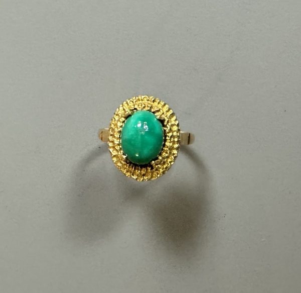 TRAVAIL ETRANGER - BAGUE en or 18k étranger serti d’une turquoise.  TDD :55. Poids brut : 6 gr (environ)
