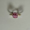 POMELLATO. Bague en or jaune 750°/°° modèle « Nudo Solita » ornée de rubis. Signée et numérotée. Avec écrin et boîte d’origine. TDD.54.